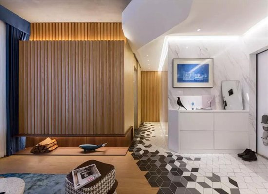 64平简约风二居室，独特的木质<em>造型</em>把客厅做成一个休闲区