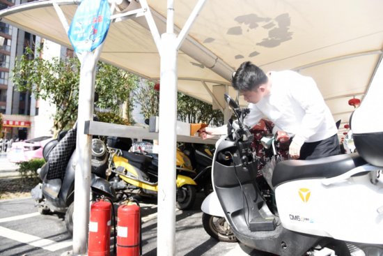 长沙这一小区“黑科技”上岗守护电动车消防安全